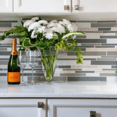 Champagne and Flowers on a kitchen counter