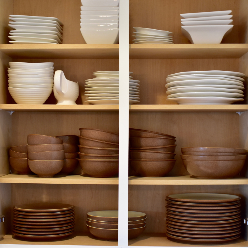 Dishes and plates in a kitchen cabinet