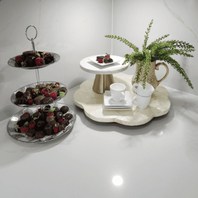 Staging details of chocolates and espresso cups help stage a dated kitchen