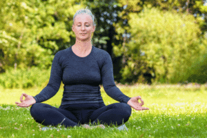 Is your health one of your life goals - woman doing yoga outside
