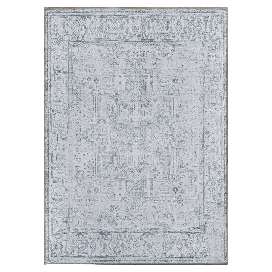 Blue and ivory distressed area rug with vintage-inspired pattern