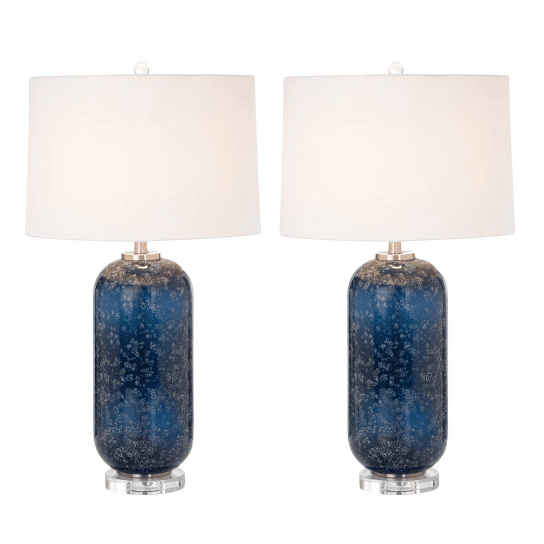 Blue glass table lamps with white drum shades and crystal bases