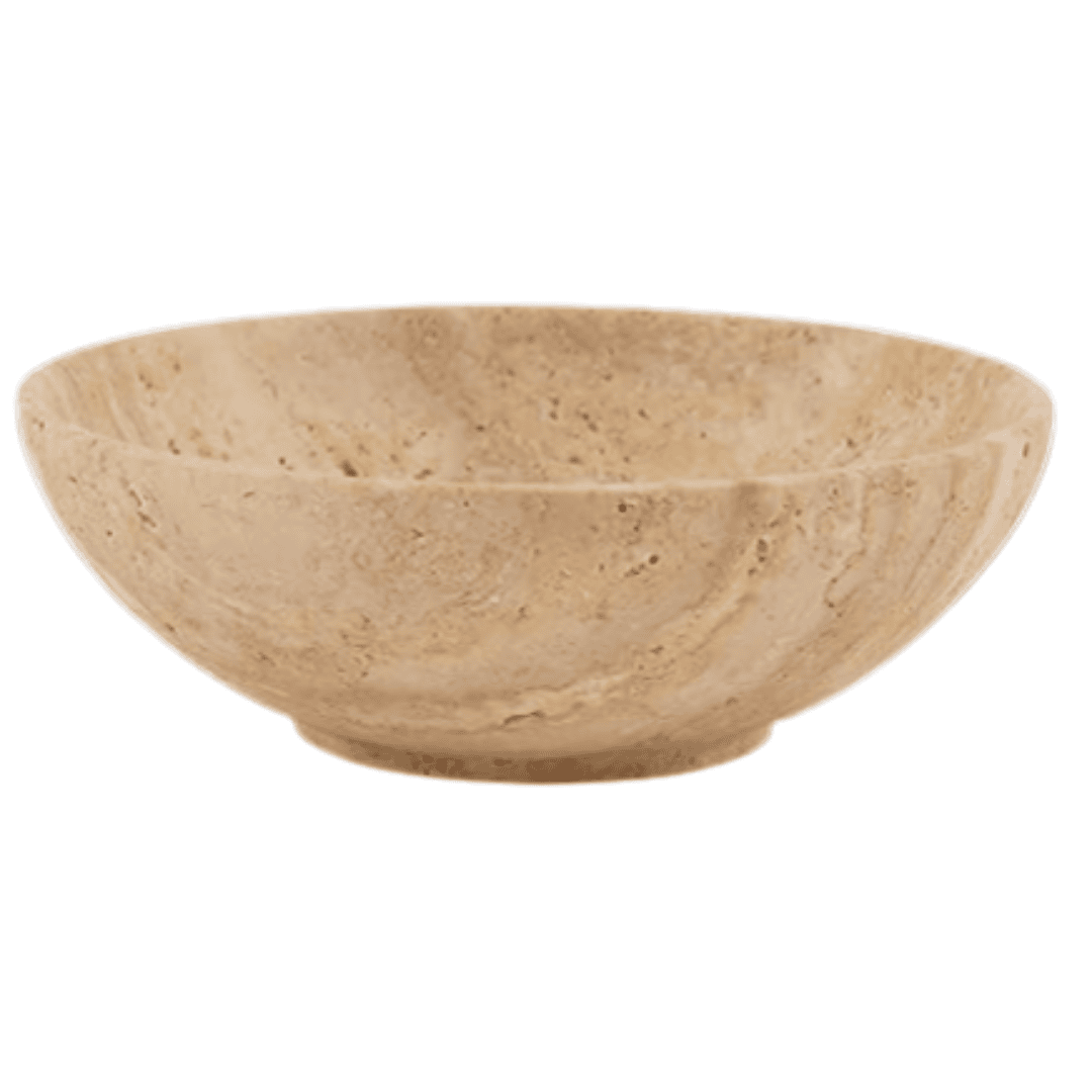 A hand-carved travertine bowl with natural texture — perfect for keys, candles, fruit, or minimalist countertop styling.