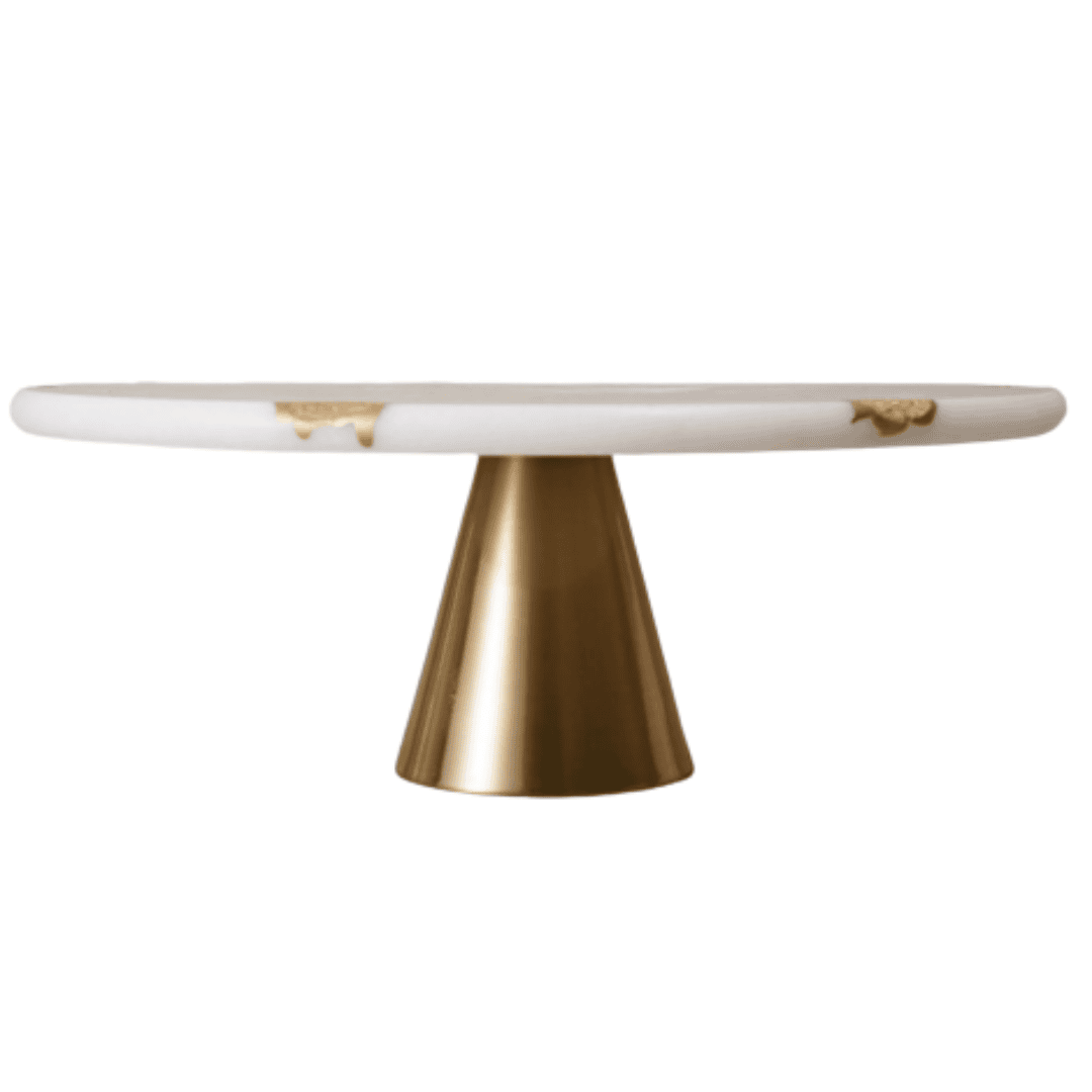 A solid marble pedestal with a matte gold base — a timeless, sculptural piece that adds height and quiet luxury to any kitchen vignette.