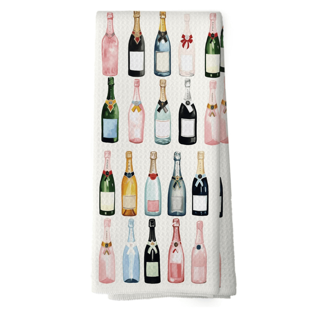 White tea towel with champagne bottles on it