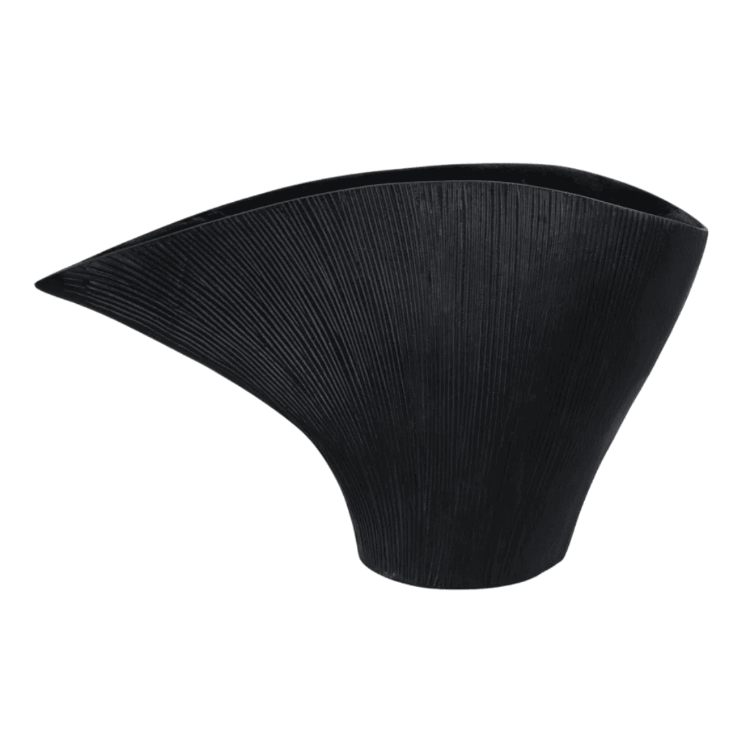 Small sculptural metal vase with subtle texture.