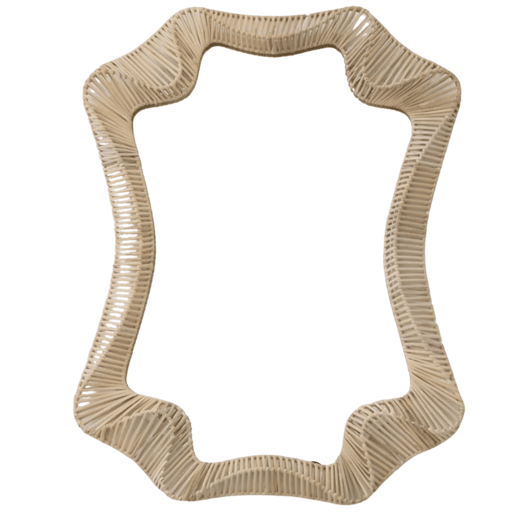Organic rattan mirror with soft curves and coastal warmth
