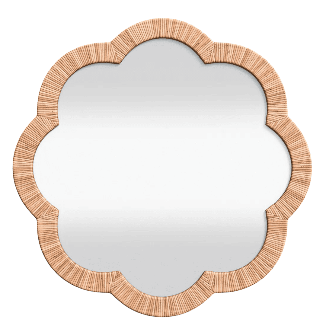 Flower-shaped cane mirror adding texture and casual charm