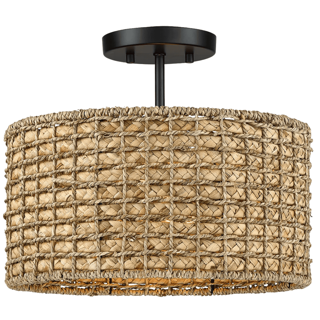 Woven rattan flush mount casting warm light and soft patterned shadows.