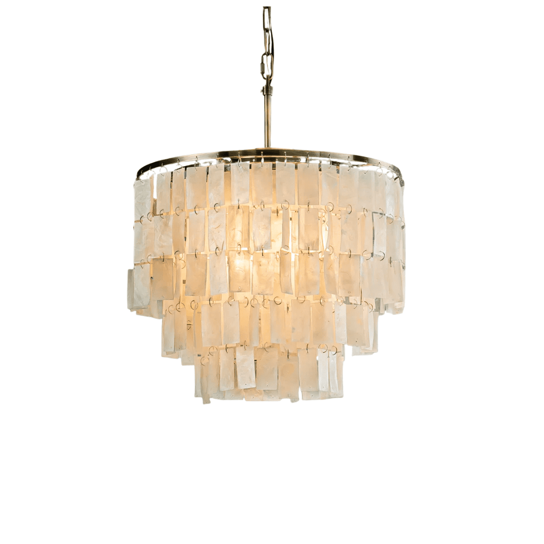Antique bronze chandelier with layered capiz shells for soft, coastal-inspired illumination.