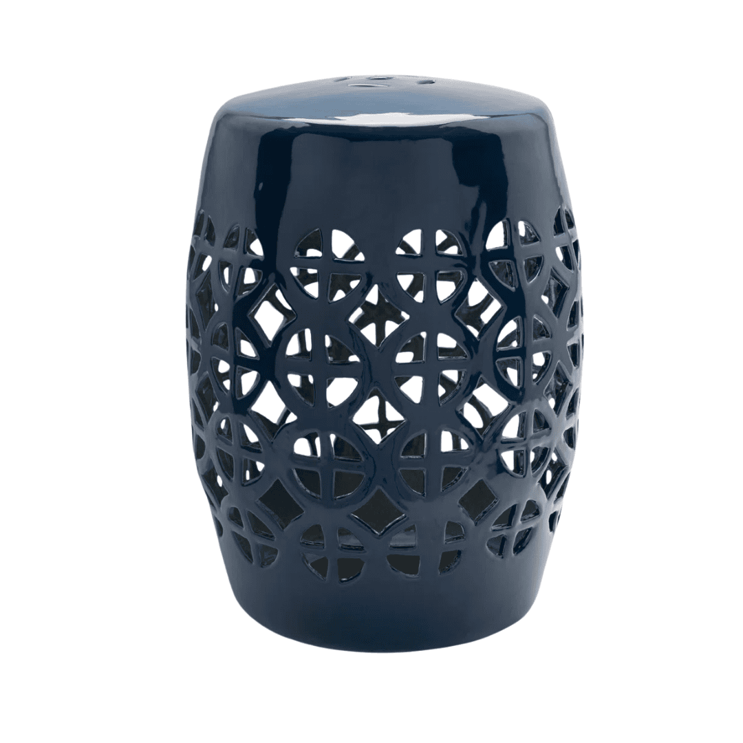 Glossy ceramic stool doubling as seat or accent table.