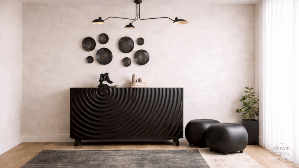 Contemporary entryway styled with sculptural furniture, warm neutral tones, modern lighting, and minimalist accessories.