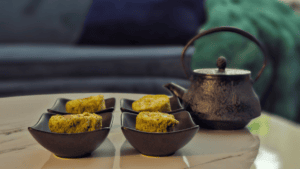 Tea setting with simple dishes representing Ma, the Japanese philosophy of space, restraint, and thoughtful living.