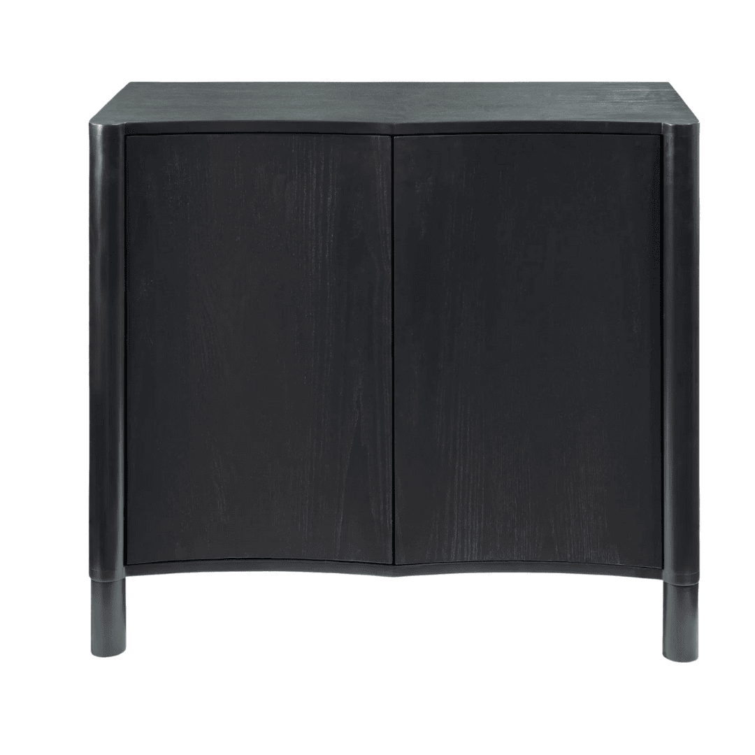 A sculptural storage cabinet with a softly curved profile that adds warmth and interest to a modern entryway.