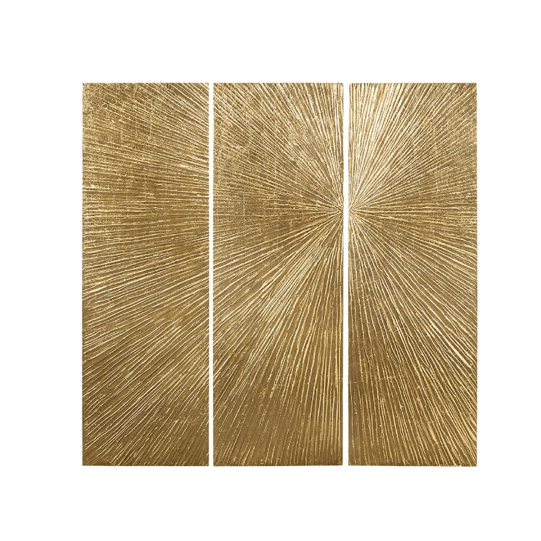 Artwork Gold sunburst wall panels introduce texture and rhythmic repetition.