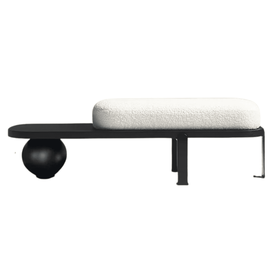 Bouclé bench with sculptural metal legs and clean lines.