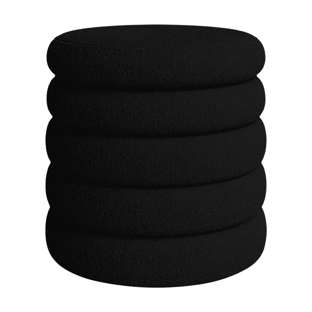 Ottoman Stacked storage ottoman with sculptural, column-like form.