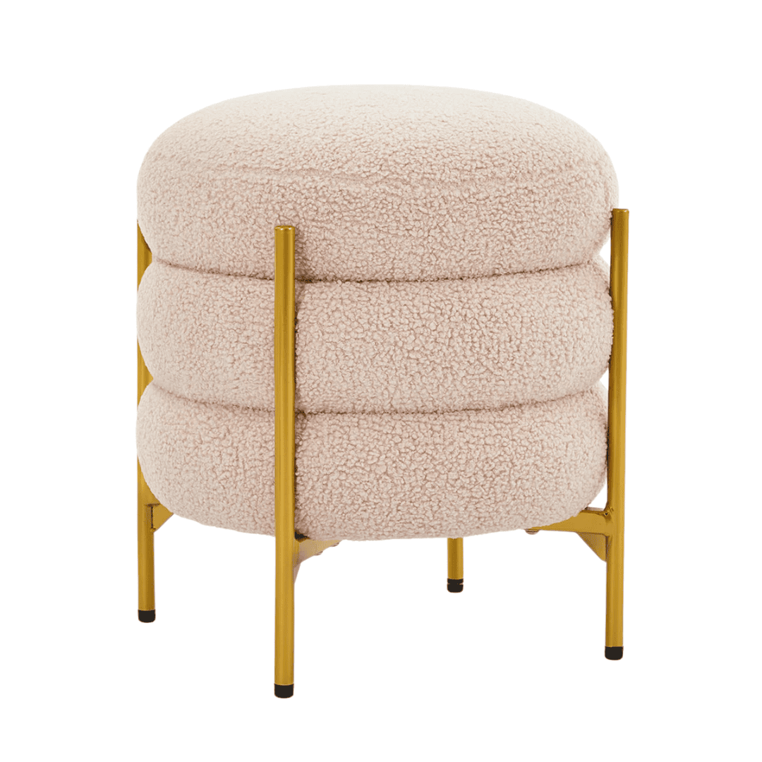 Round upholstered ottoman with hidden storage and brass legs.