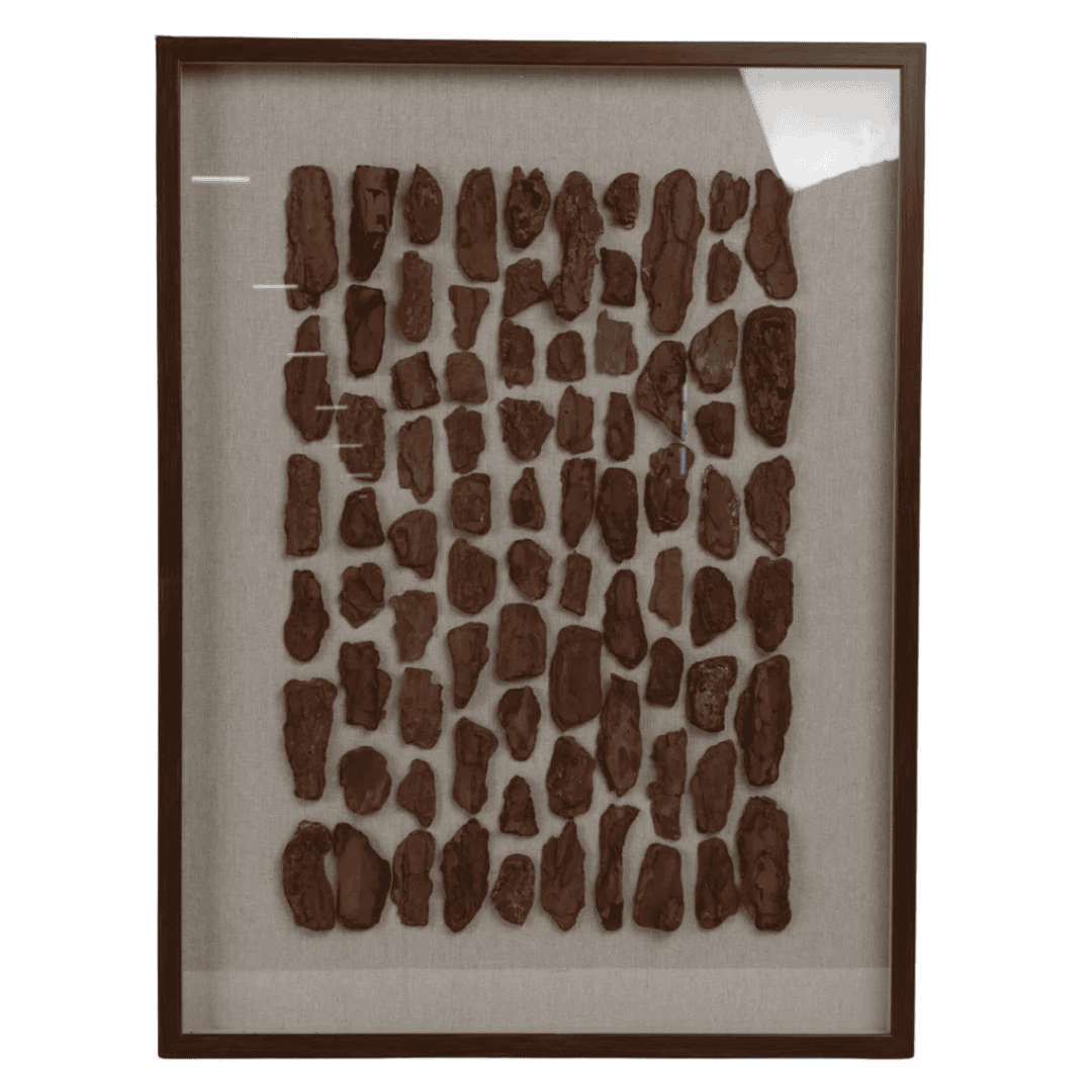 Carved wood cabinet with layered texture and warmth.