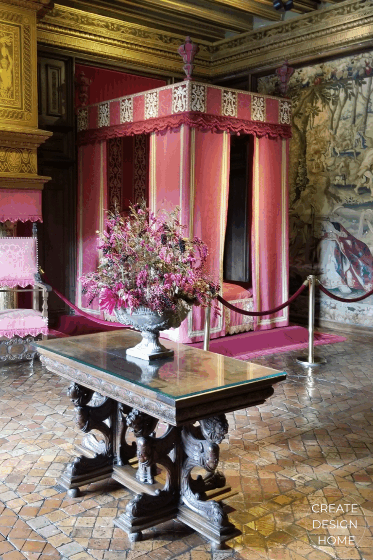Red bedchamber interior at Château de Chenonceau prepared for King Louis XIV. The importance of red in interior design