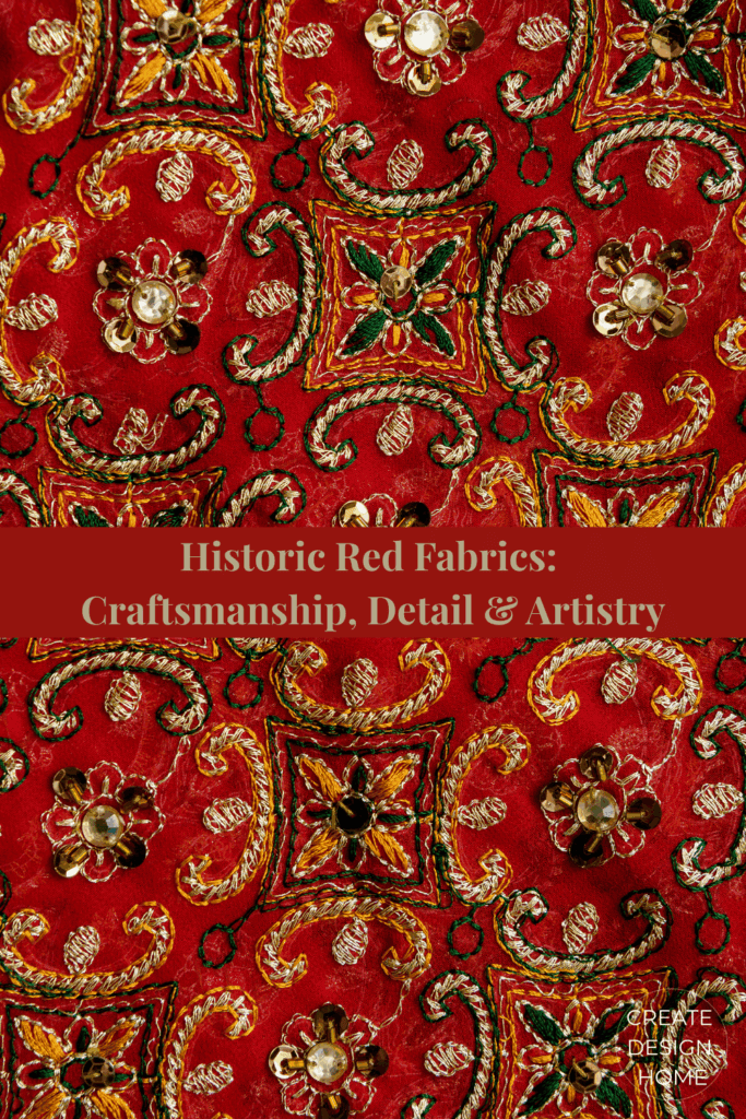 Historic red embroidery with intricate floral pattern and rich textile detail.