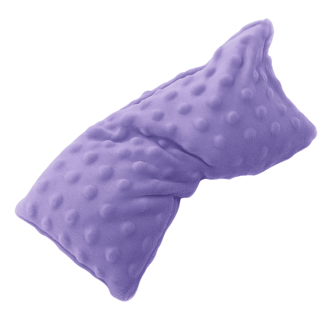 A softly weighted lavender eye pillow that provides gentle comfort and relaxation, ideal for quiet moments, meditation, or unwinding before sleep.
