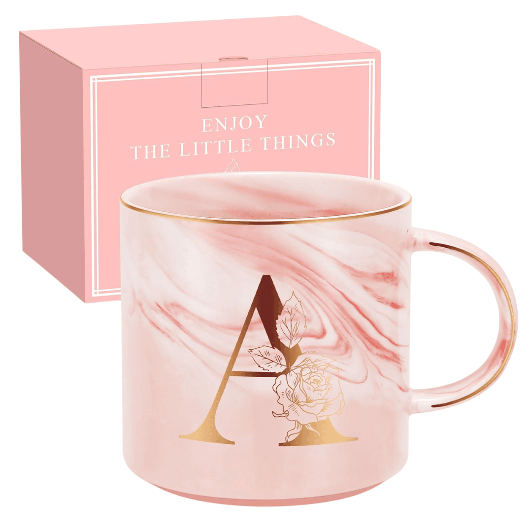 Pink ceramic coffee mug with gold initial monogram