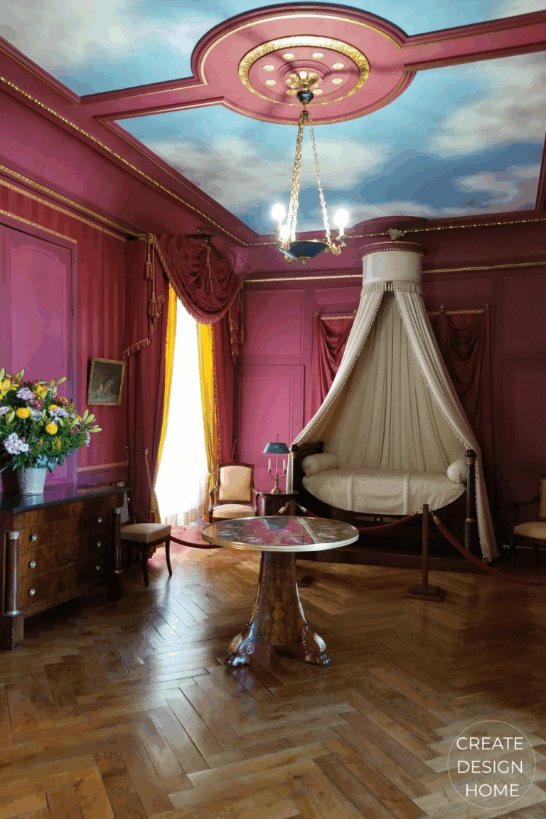 Empire style red bedchamber at Château de Villandry shows how red in interior design is used