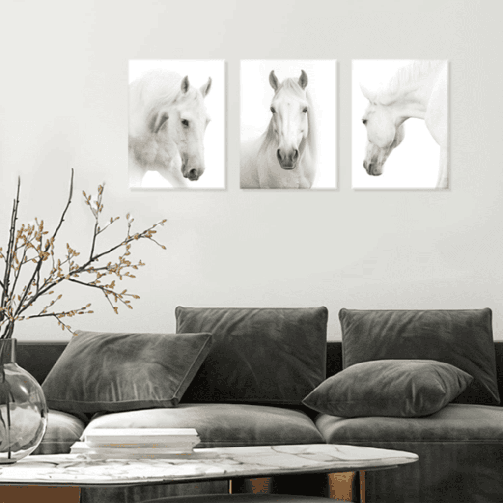 Equine Decor in Interior Design Black and white horse portraits displayed above modern gray sofa