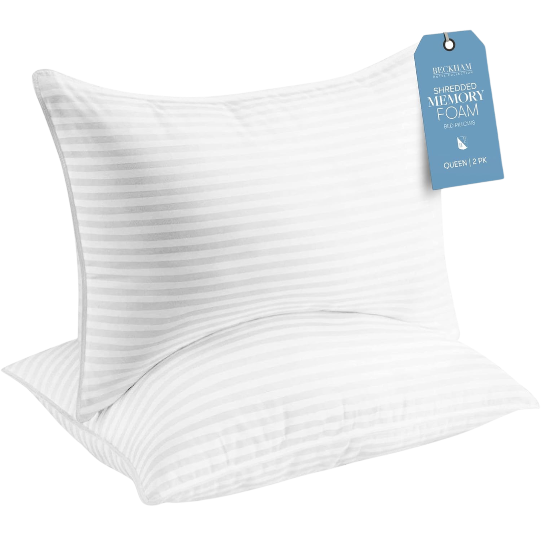 White striped hotel style pillows with soft supportive fill