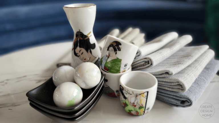 Japanese-inspired tea set with folded textiles styled to represent Seiri, putting in order.