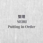 Soft grey textured graphic with the title Seiri — Putting in Order, a Japanese Philosophy.