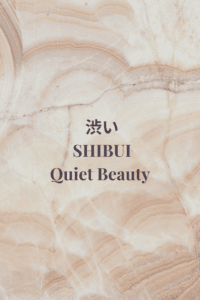 Warm marble-textured minimalist graphic with the title Shibui — Quiet Beauty.