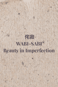 Warm natural textured graphic with the title Wabi-Sabi — Beauty in Imperfection.