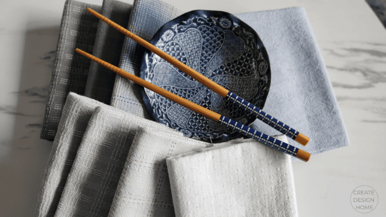 Blue patterned bowl with chopsticks and folded linens representing Ikigai, reason for being.