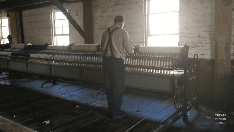 Person working at a textile machine representing Kaizen, continuous improvement through dedication and repetition.
