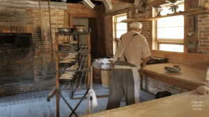Craftsperson working in a traditional workshop reflecting Kaizen, continuous improvement through patience, skill, and daily practice.