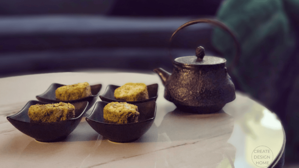 Tea and simple desserts representing Mushin, calm focus, through quiet everyday rituals.
