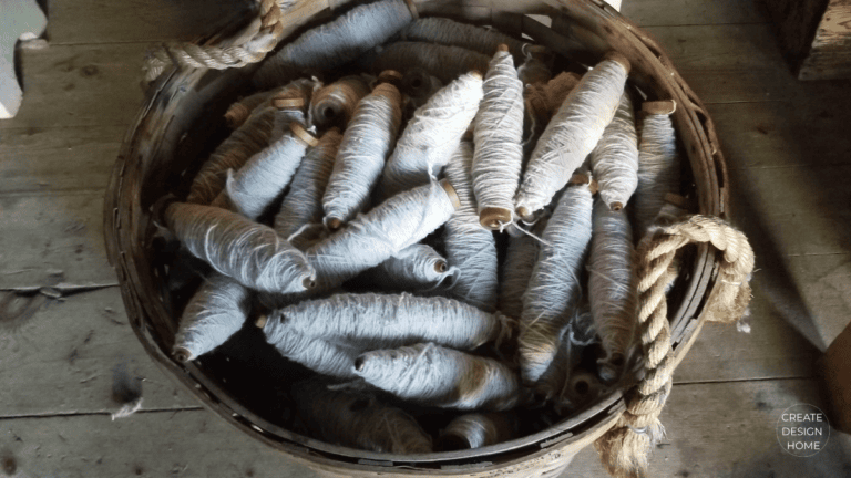 Basket of wool styled to reflect Wabi-Sabi, beauty in imperfection through natural texture and rustic simplicity.