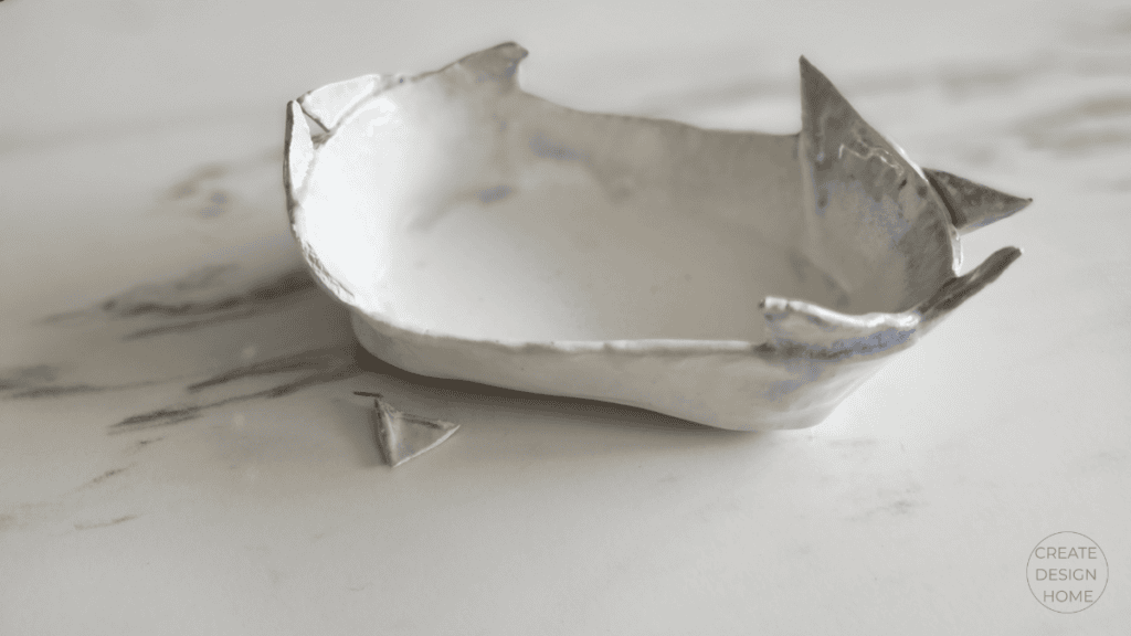 Broken ceramic bowl representing Wabi-Sabi, beauty in imperfection through age, wear, and quiet character.