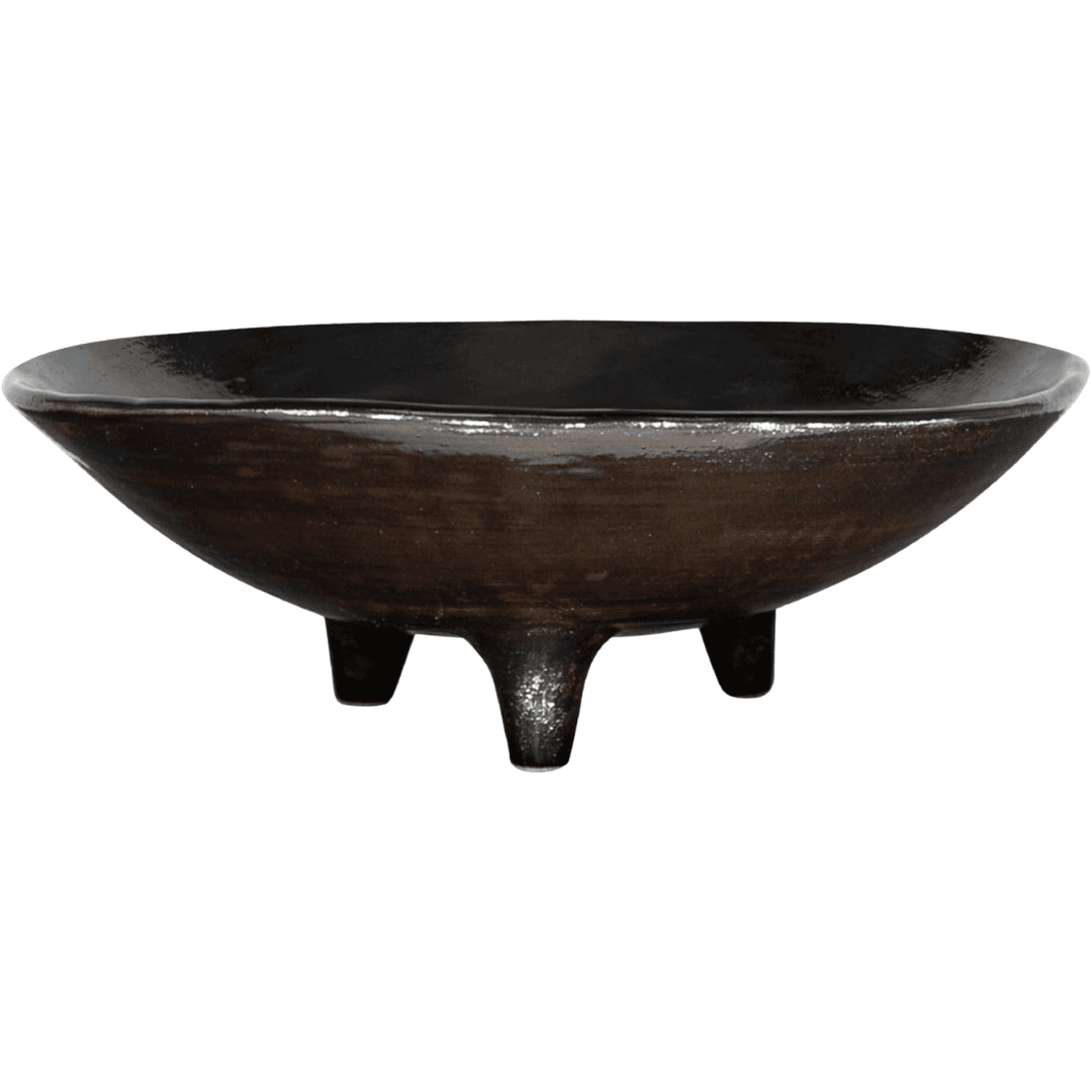 Handmade black ceramic bowl inspired by wabi-sabi design