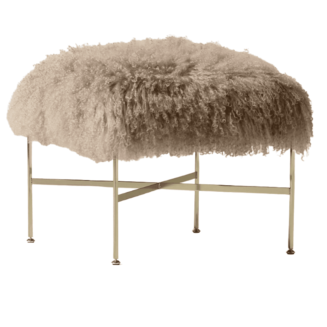 CB2 Director shearling ottoman with brass frame by Paul McCobb
