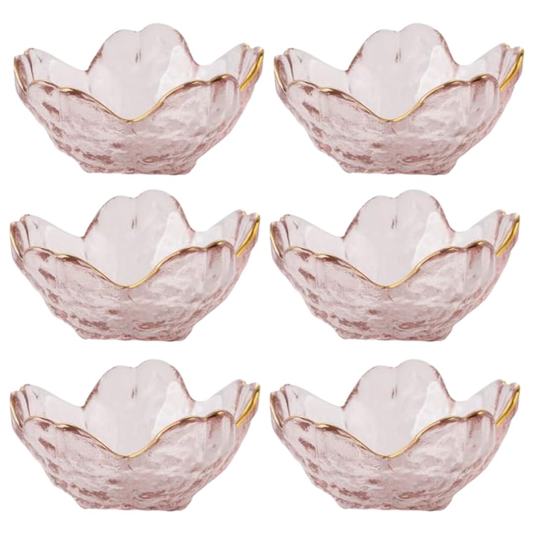 Pink glass dessert bowls for serving sweets and small treats at a garden tea party.