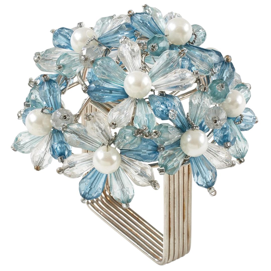 Blue beaded floral napkin rings with pearl accents