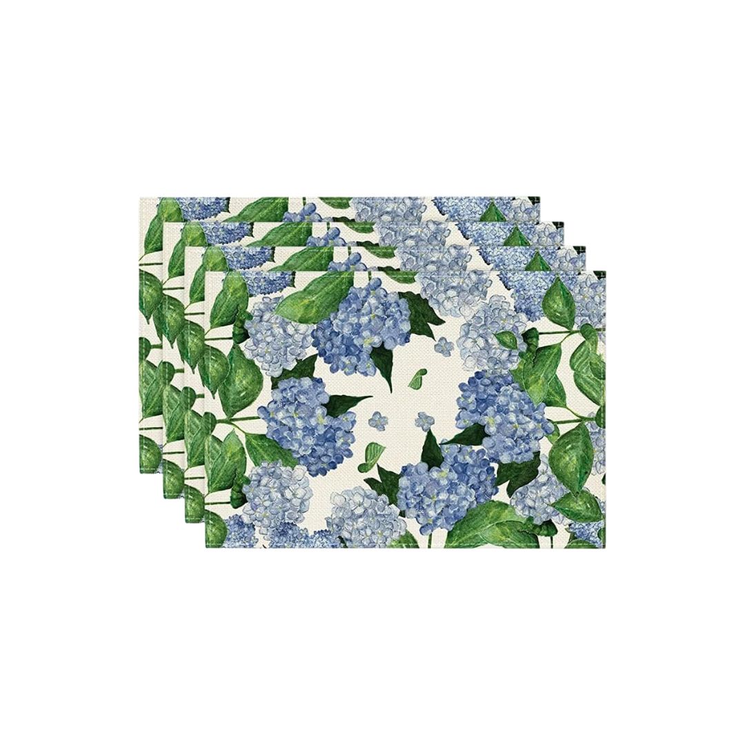 Blue hydrangea floral placemats with green leaves