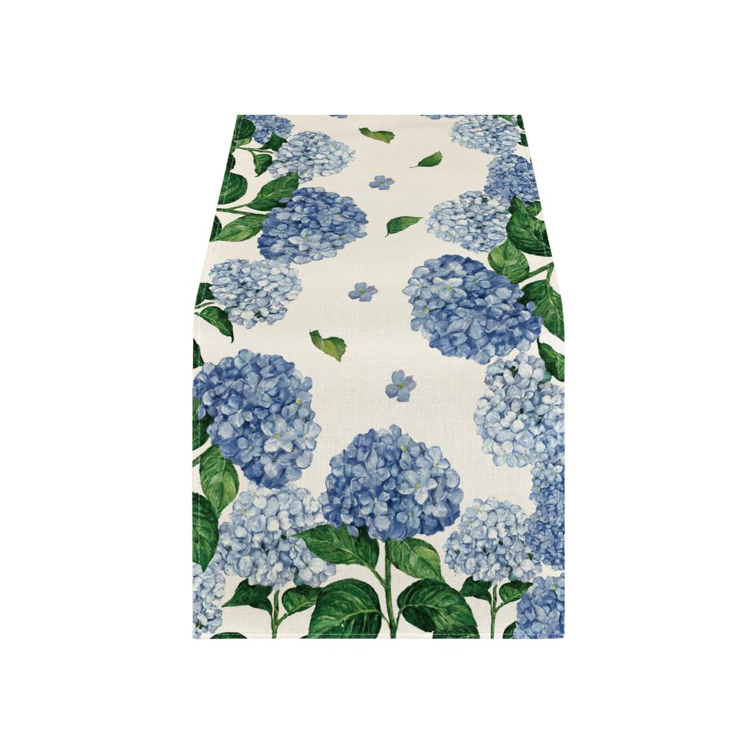 Blue hydrangea floral table runner with green leaves