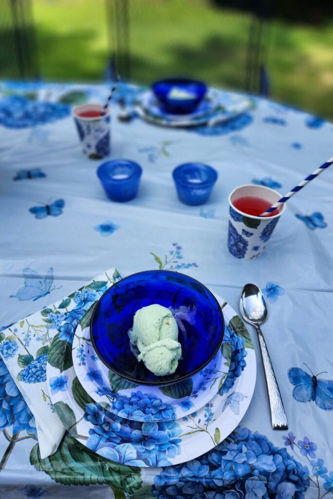 Blue hydrangea table set with matching paper party tableware