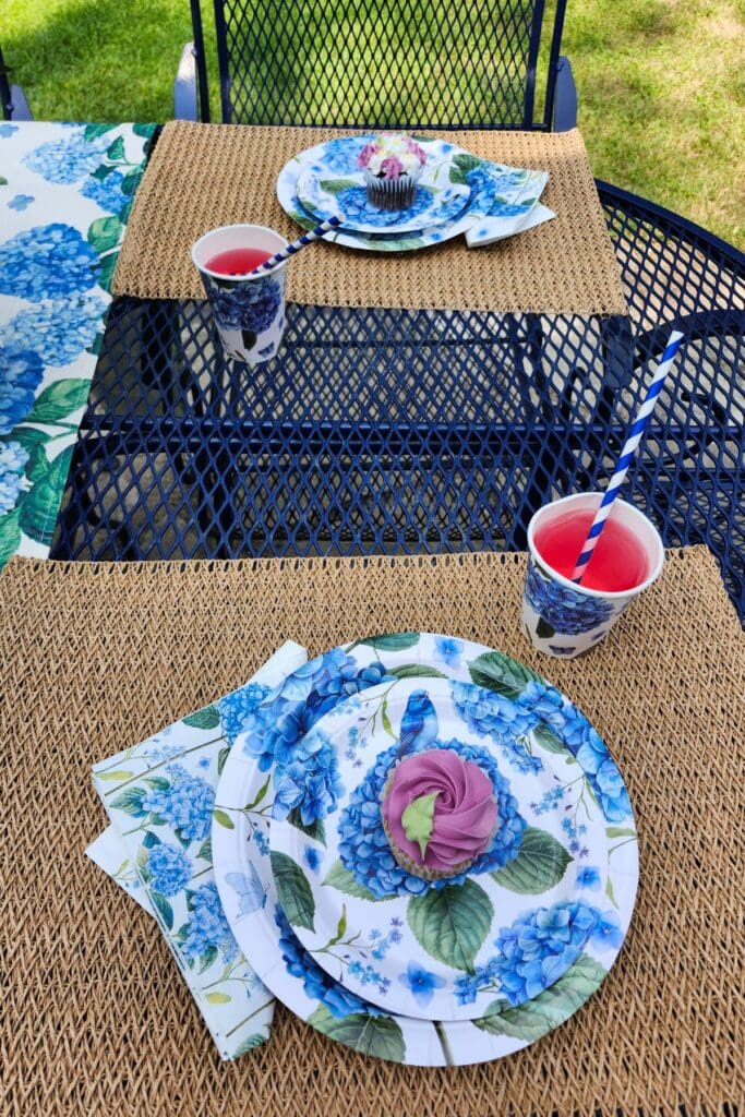 Hydrangea table with seagrass placemats and floral paper plates