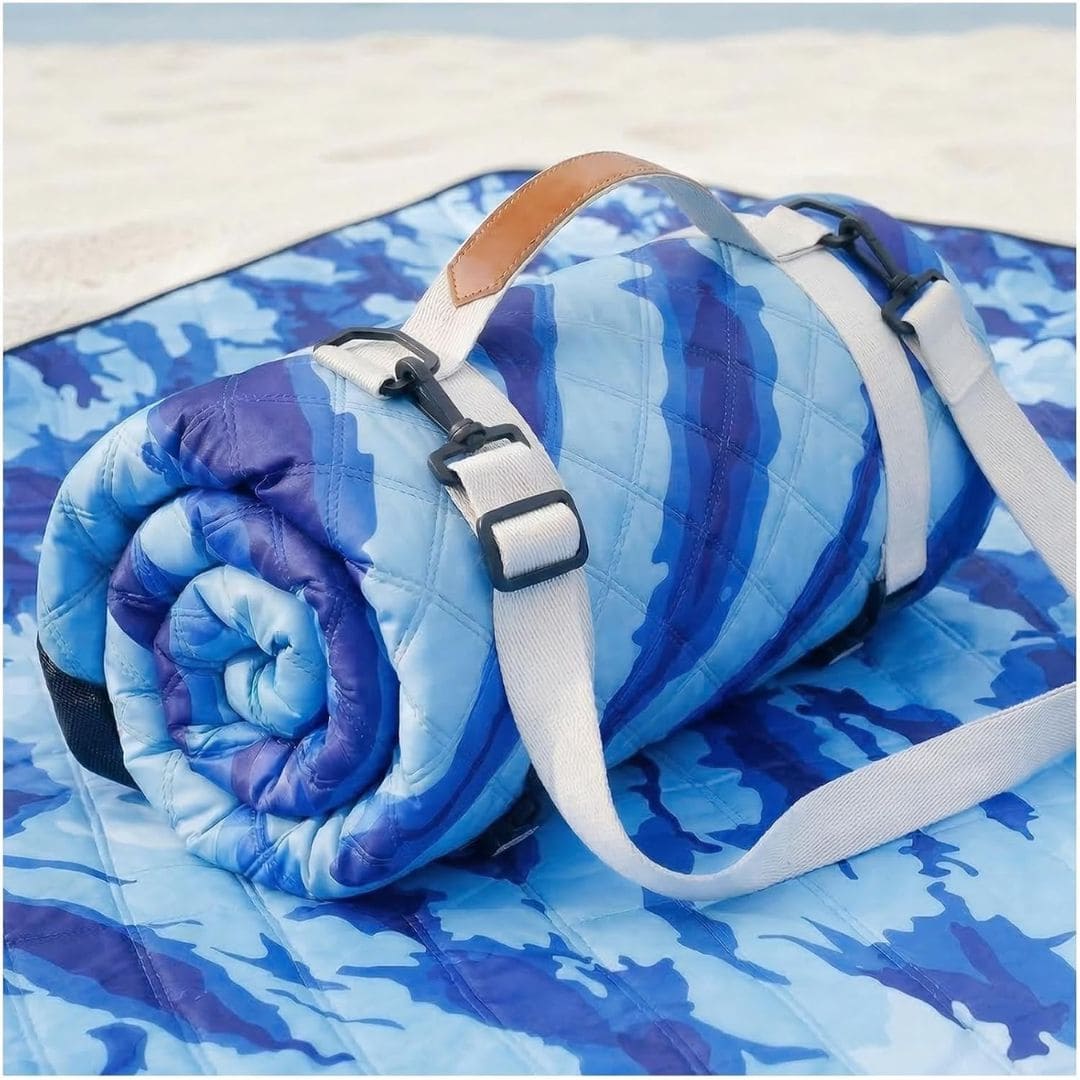 Blue waterproof outdoor picnic blanket with carrying straps