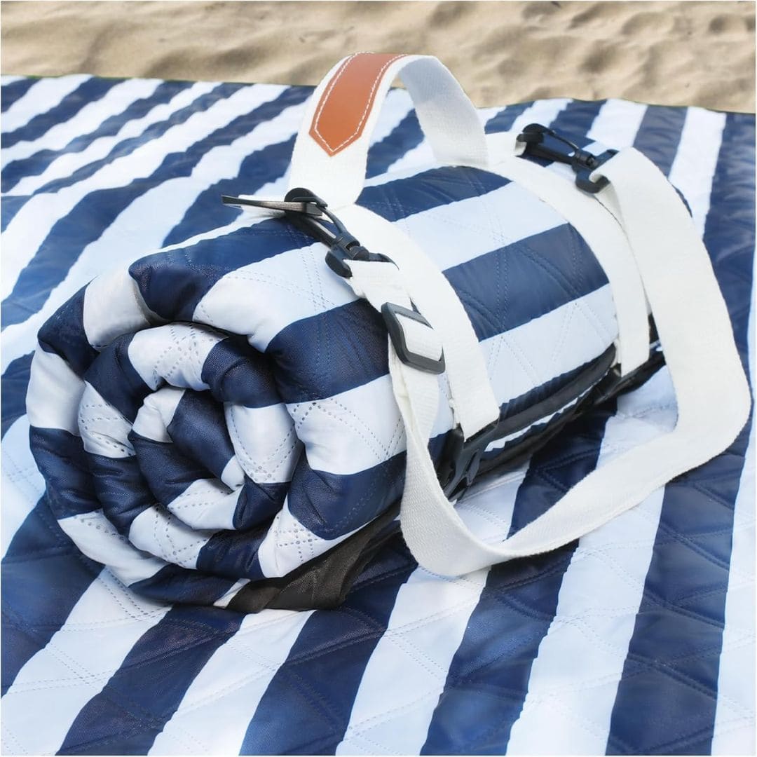 Navy and white striped outdoor picnic blanket with carrying handles